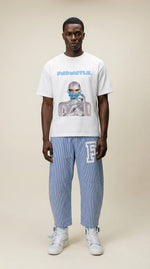Silver Hawk Tee lifestyle/detail image | FNDMNTLS