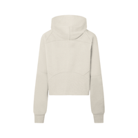 Back view of beige cropped half-zip hoodie for women, showcasing hood and curved seam details for a modern athletic look.