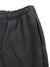 Side pocket detail on Mr Rogers FNDMNTLS Flared Sweatpants in black, emphasizing functionality and soft cotton texture.