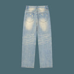 Back view of distressed raw hem denim jeans
