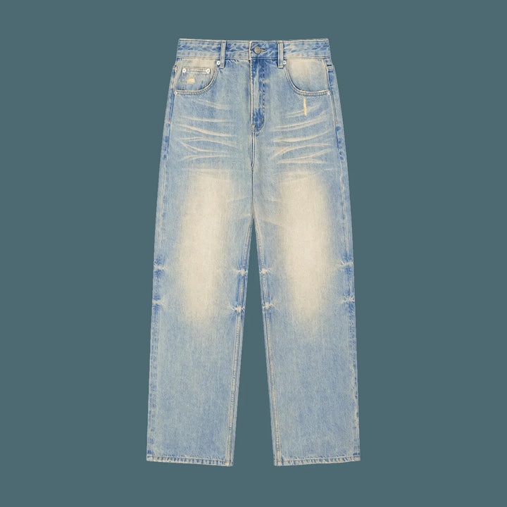 Light wash distressed raw hem denim jeans