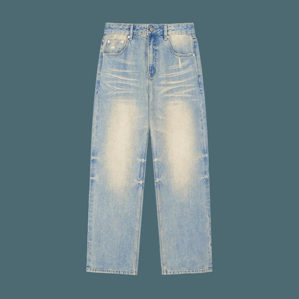 Light wash distressed raw hem denim jeans