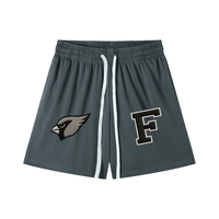 Charcoal gray Chrome Cardinals Mesh Drawstring Shorts with bold front graphics, unisex design ideal for casual and athletic wear.