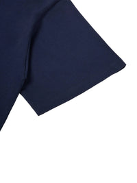 Close-up of navy fabric and sleeve hem