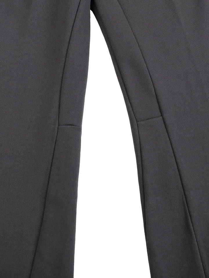 Inner seam detail of Mr Rogers FNDMNTLS Flared Sweatpants, showcasing quality stitching and smooth cotton fabric.