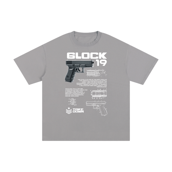 Gray Glock 19 unisex t-shirt made from pure cotton, featuring firearm schematics and bold white print for a tactical streetwear vibe.