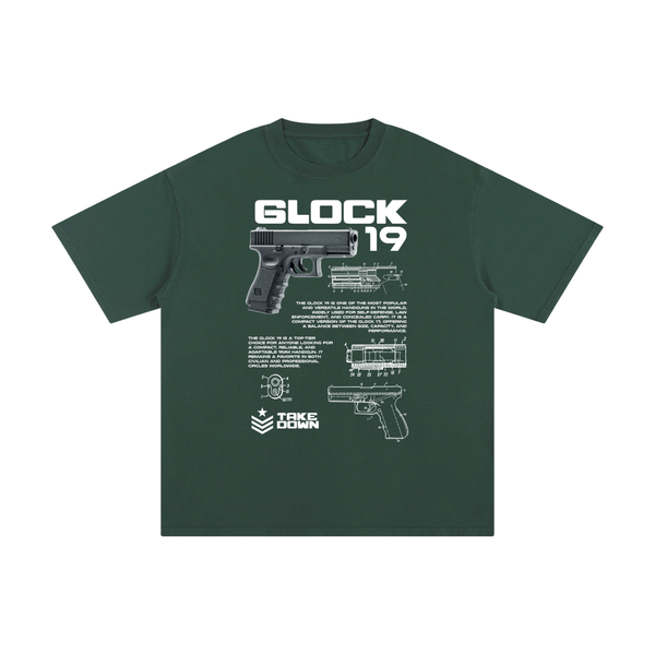 Green Glock 19 unisex cotton t-shirt featuring firearm diagram and bold white graphics, perfect for tactical-inspired fashion.