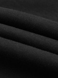 Layered view of black cotton fabric from Essential Cotton T-Shirt hoodie, emphasizing 320 GSM thickness and quality.