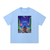 Light blue Ninja Magic Essential Cotton T-Shirt showcasing a bold graphic print, ideal for relaxed Spring and Summer outfits.