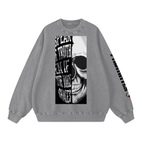 Grey Snow Washed Oversized Sweatshirt with skull graphic and bold typography, unisex long sleeve with sleeve branding for streetwear style.