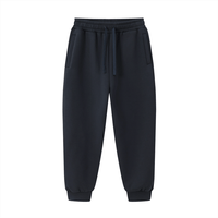 Front view of navy Essential Drawstring Jogged Sweatpants | Unisex, Regular, Cotton Blend with drawstring waist and side pockets.