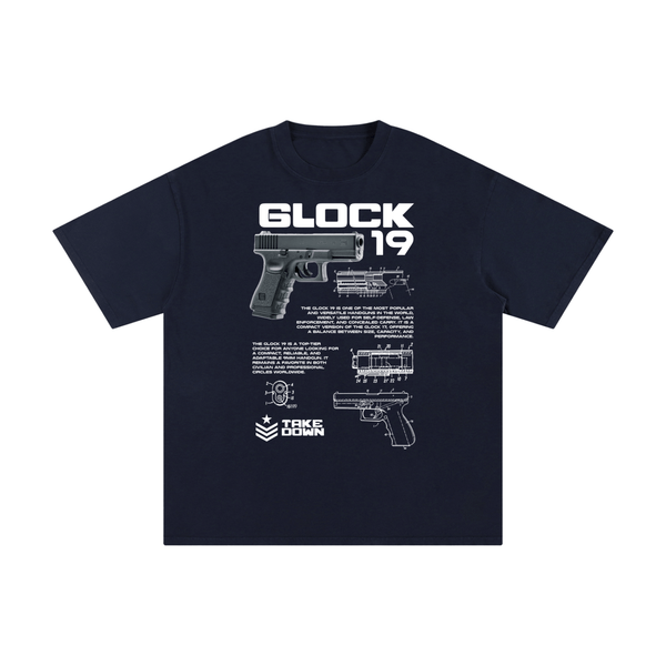 Navy blue Glock 19 unisex cotton t-shirt with detailed firearm illustration and white text, combining comfort and bold design.
