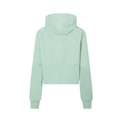 Rear view of mint green cropped half-zip hoodie for women, highlighting the structured paneling and relaxed fit.