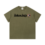 Olive green Balenciaga Vintage Wash Cotton T-Shirt with neck label and bold chest graphic, crafted for casual summer styling.