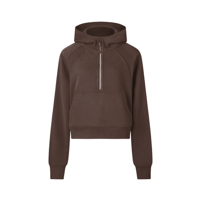 Chocolate brown cropped half-zip hoodie for women with a front zip and kangaroo pocket, combining sporty style and cozy comfort.
