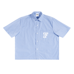 Blue striped shirt with a white 'F' logo on a white background
