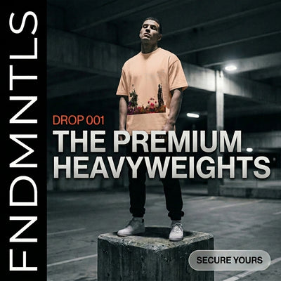 Person standing on a concrete block in an urban setting with promotional text for 'The Premium Heavyweights' album.