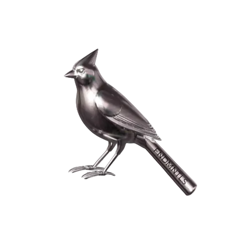 Metallic bird-shaped object with 'FNDMNTLS' branding on a white background