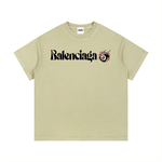Beige Balenciaga Vintage Wash Cotton T-Shirt with visible neck label, bold logo, and flaming 8-ball graphic for casual fashion.
