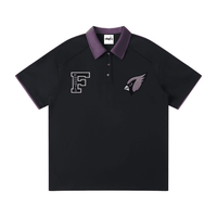 Black unisex polo shirt with purple contrast collar and embroidered F and cardinal logos