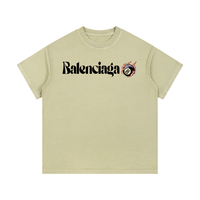 Balenciaga Vintage Wash Cotton T-Shirt in beige with bold logo and flaming 8-ball graphic, ideal for casual summer wear.