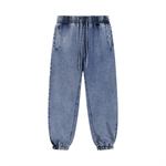 Light blue unisex snow wash sweatpants with drawstring waist and side pockets. Soft cotton blend for stylish and cozy daily wear.