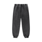 Back view of black unisex sweatpants featuring elastic waistband and cuffs. Designed for relaxed fit and everyday wear.