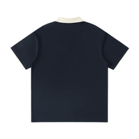 Back of the dark blue unisex polo shirt with contrast collar and embroidered F and cardinal logos