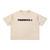 Beige Mineral Wash Boxy Cotton T-Shirt with black graphic print, designed for unisex casual style and breathable comfort.