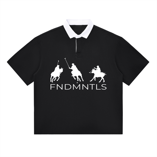 Black contrast polo shirt with white collar and FNDMNTLS logo, unisex cotton blend for casual everyday wear.