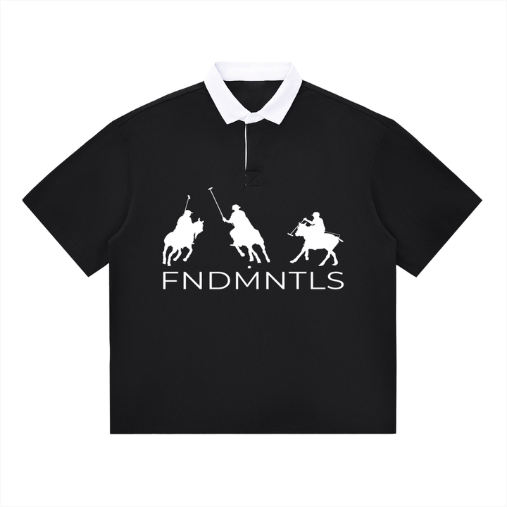 Black contrast polo shirt with white collar and FNDMNTLS logo, unisex cotton blend for casual everyday wear.