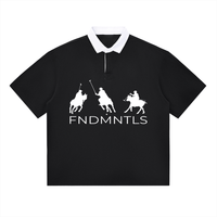 Black contrast polo shirt with white collar and FNDMNTLS logo, unisex cotton blend for casual everyday wear.
