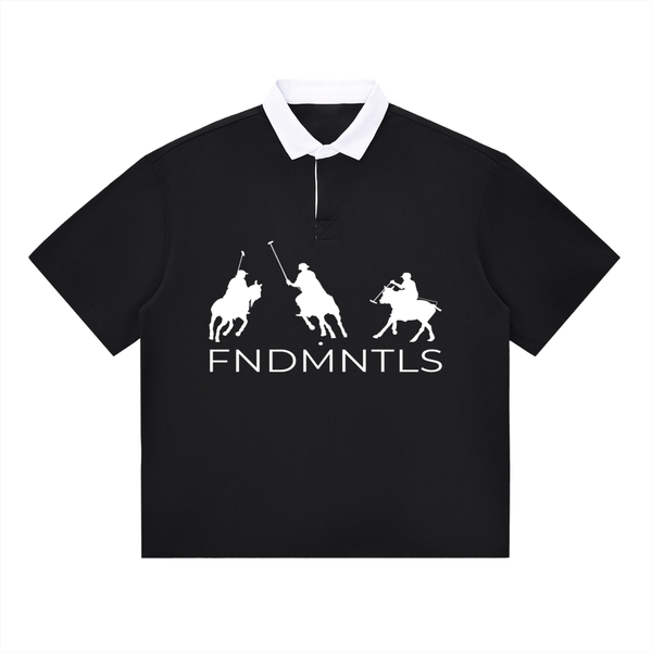 Black contrast polo shirt with white collar and FNDMNTLS logo, unisex cotton blend for casual everyday wear.