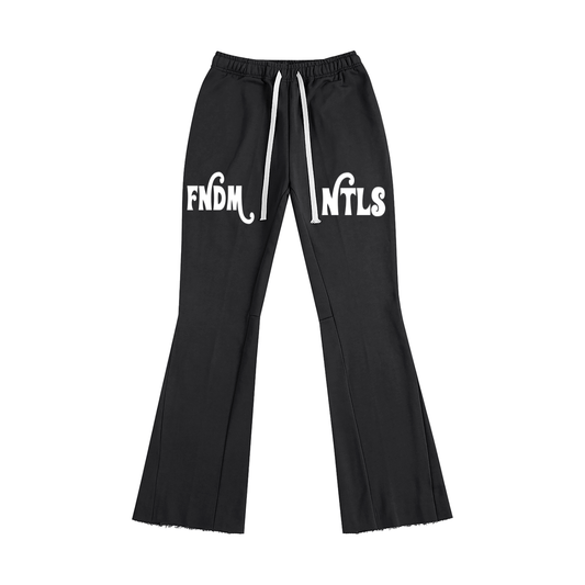 Mr Rogers FNDMNTLS Flared Sweatpants in black with white drawstring and bold logo, featuring wide-leg silhouette and raw hem.