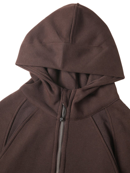 Close-up of hood on chocolate brown cropped half-zip hoodie for women, showing stitching and zip detail for a sleek finish.