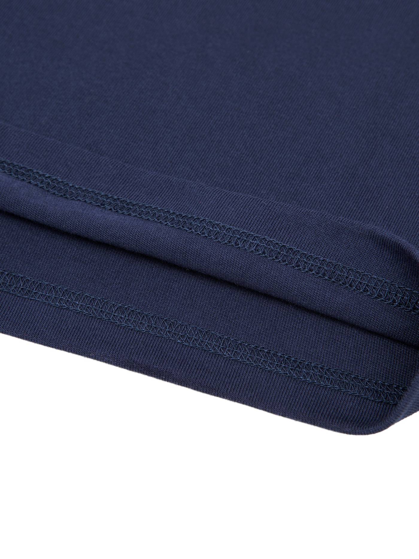 Close-up of navy blue fabric hem