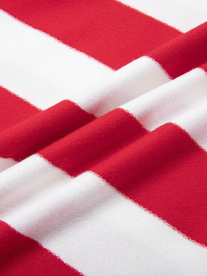 Folded fabric detail of red and white Color Block Stripe Polo Shirt highlighting smooth cotton blend and vibrant stripe pattern.