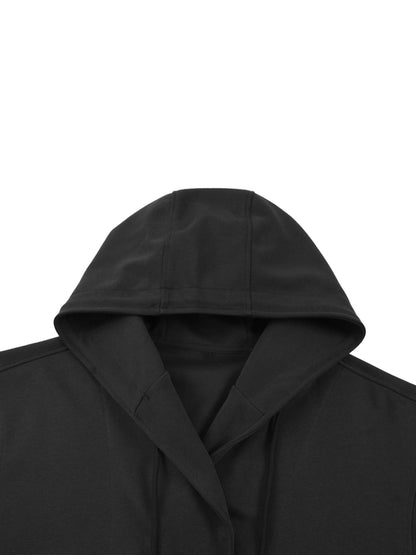 Close-up of black Essential Cotton T-Shirt hoodie hood, highlighting structured stitching and soft cotton fabric.