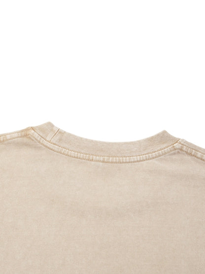 Neckline detail of beige Mineral Wash Boxy Cotton T-Shirt, highlighting reinforced stitching and garment wash texture.