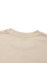 Neckline detail of beige Mineral Wash Boxy Cotton T-Shirt, highlighting reinforced stitching and garment wash texture.