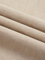 Close-up of beige Mineral Wash Boxy Cotton T-Shirt fabric texture, emphasizing its smooth knit and mineral wash finish.