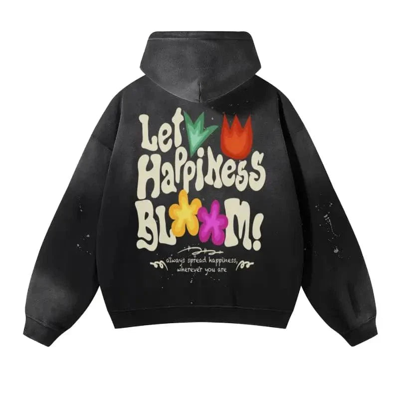 Back view of Let Happiness Bloom Vintage Wash Frayed Fleece Hoodie in black with colorful floral print and uplifting message. Casual oversized streetwear.