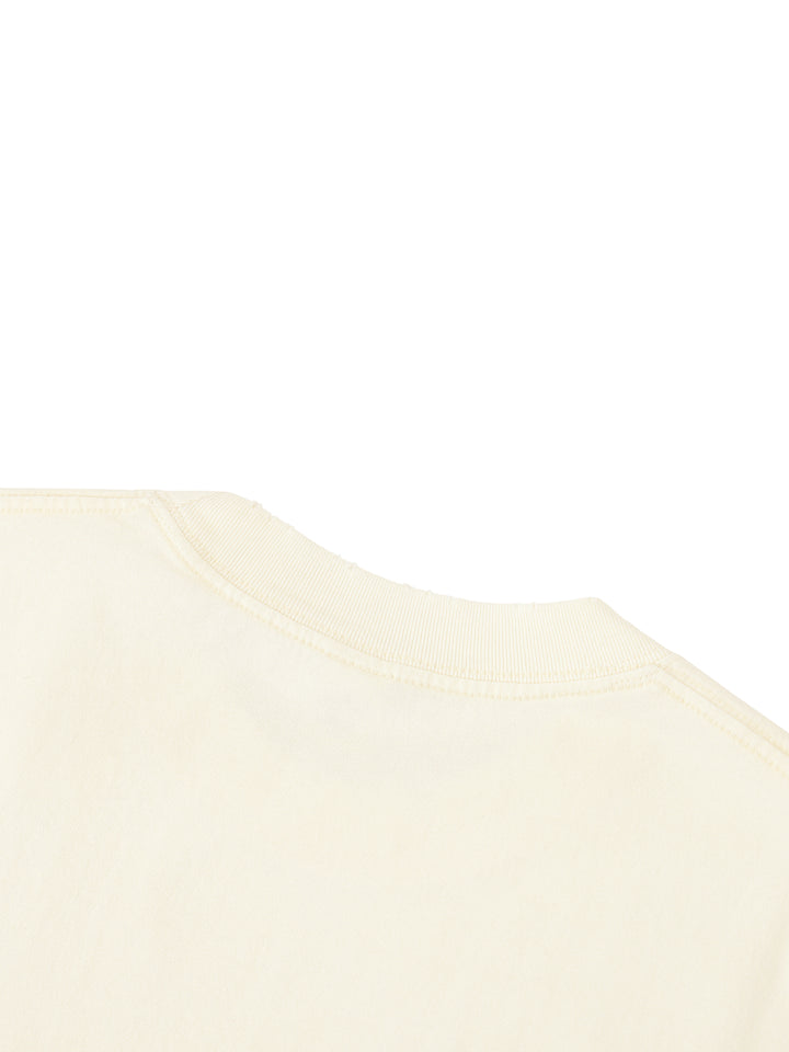 Collar of the light apricot Standard Bearer Vintage Wash T-Shirt to display the quality of the t-shirt