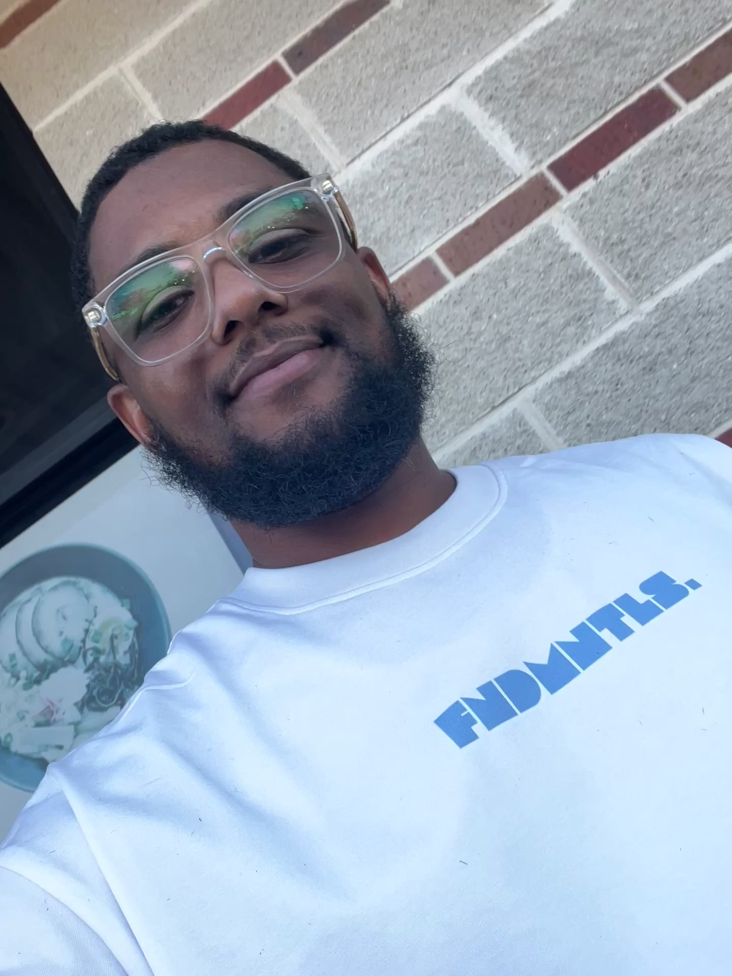 Model wearing Carolina Heavyweight Essentials Tee | FNDMNTLS