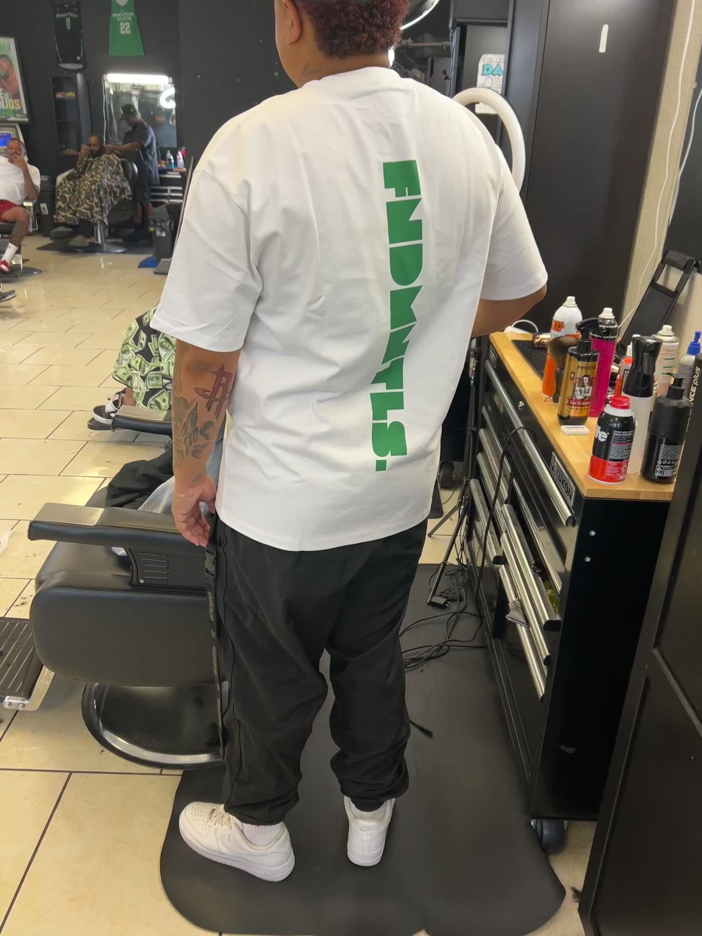 Model wearing Green Logo Heavyweight Essential Tee | FNDMNTLS