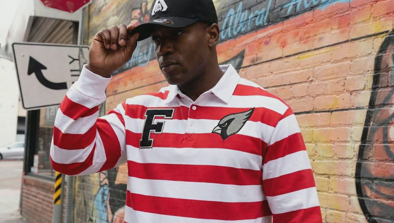 Model wearing Color Block Stripe Polo Shirt in red and white with embroidered F and bird logo, styled for casual streetwear fashion.