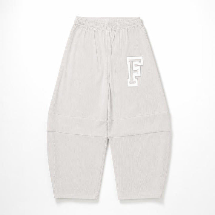 Light gray sweatpants with an elastic waistband, cuffed ankles, and a white outlined letter 'F' logo on the upper left leg, shown flat on a white background.
